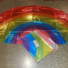 Rainbow shape 32” Mylar balloon multi color. New in plastic never opened