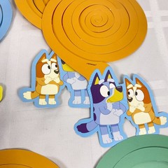 Bluey Customizable Banner. Added in 11 spiral hanging deco pieces