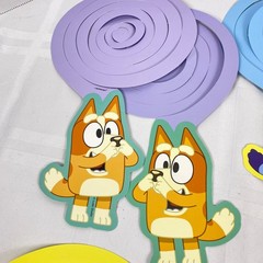 Bluey Customizable Banner. Added in 11 spiral hanging deco pieces
