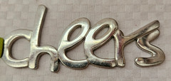 Silver Cursive Letter Balloon «Cheers»