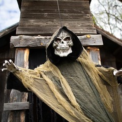 Morris Costumes 6 ft Hanging Animated Reaper with Light-Up Eyes – Gray