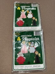 Two Sets Of 4 Paper Honeycomb Christmas Decorations. A total of 8 for the price