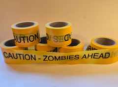 CAUTION ZOMBIES! Halloween Warning Tape Banner – 250+ feet long!