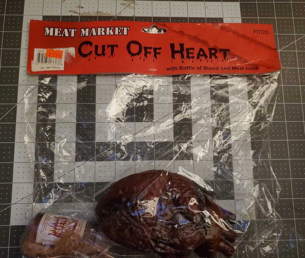 Halloween cut off Heart Prop with bottle of blood meat hook Life Size Chop Shop