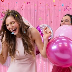 Pack of 2 pink metallic mesh curtains for parties, birthdays or baby showers.