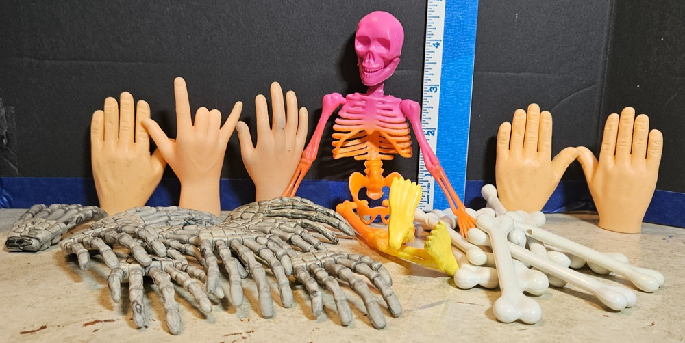 Bag of 26 Bones, Hands, and Skeleton Plastic/Rubber Halloween Decorations