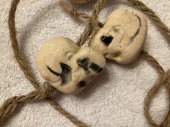 HANGING STRINGS OF SKULLS Halloween Party Decoration, Foam Skulls on Ropes.
