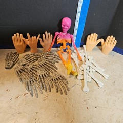 Bag of 26 Bones, Hands, and Skeleton Plastic/Rubber Halloween Decorations