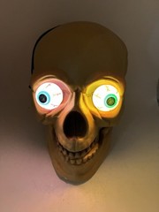 Halloween Plastic Blow Mold Skull Light-Up Color Change Eyes Skeleton Head