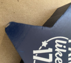 Two “Party Like It’s 1776” wooden star-shaped party decorations