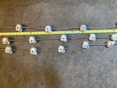 HANGING STRINGS OF SKULLS Halloween Party Decoration, Foam Skulls on Ropes.
