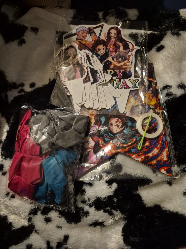Demon Slayer themed Happy Birthday anime party supplies decoration kit.