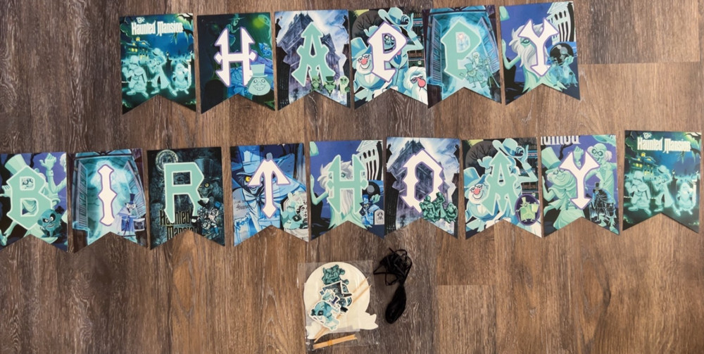 Disney’s Haunted Mansion Birthday Party Pack – Banner, 12 Cupcake Picks & Topper