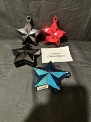 Star Shaped Balloon Weights 5.5oz ea lot of 4 – 2 Black, One Red, One Blue Party