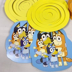 Bluey Customizable Banner. Added in 11 spiral hanging deco pieces