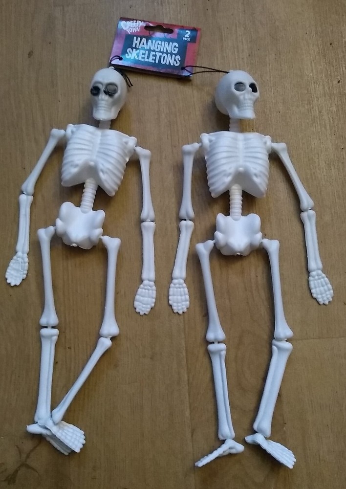 2 SKELETONS White Jointed Hanging Plastic 36x12x5.5cm New Funky Fun Decoration