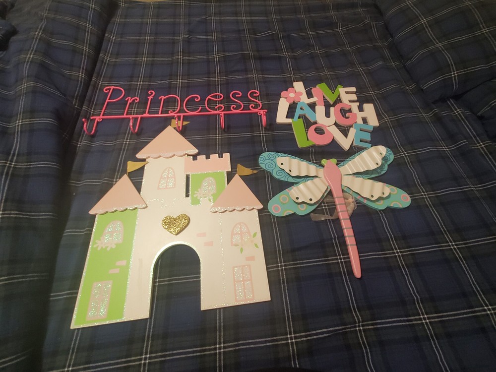 Hobby Lobby Princess room decorations for girl in pink, blue, green, and gold