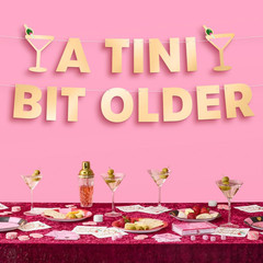 a Tini Bit Older Gold Foil Banner – 5 Ft. | Martini Decoration, Birthday Party S