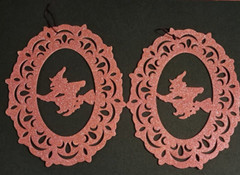 Sparkly Hanging Halloween decorations. Black cobwebs and Gold witches.