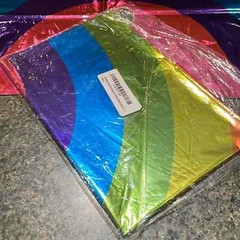 Rainbow shape 32” Mylar balloon multi color. New in plastic never opened