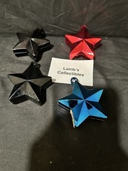 Star Shaped Balloon Weights 5.5oz ea lot of 4 – 2 Black, One Red, One Blue Party