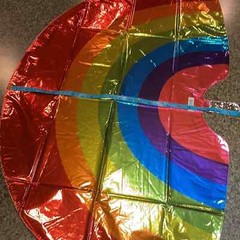 Rainbow shape 32” Mylar balloon multi color. New in plastic never opened
