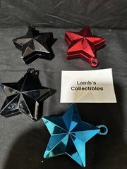 Star Shaped Balloon Weights 5.5oz ea lot of 4 – 2 Black, One Red, One Blue Party