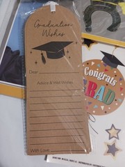 Graduation cap decorations, sign, napkins, garland, wishes, window cling. favors