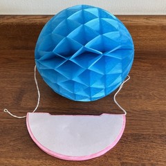 1 new (pink) , 1 used once (blue) tissue paper honeycomb pompom ball decorations