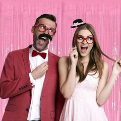 Pack of 2 pink metallic mesh curtains for parties, birthdays or baby showers.