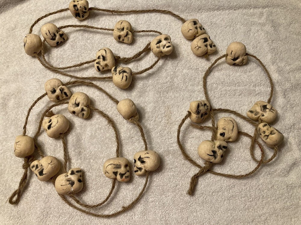 HANGING STRINGS OF SKULLS Halloween Party Decoration, Foam Skulls on Ropes.