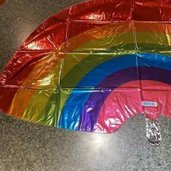 Rainbow shape 32” Mylar balloon multi color. New in plastic never opened