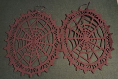 Sparkly Hanging Halloween decorations. Black cobwebs and Gold witches.