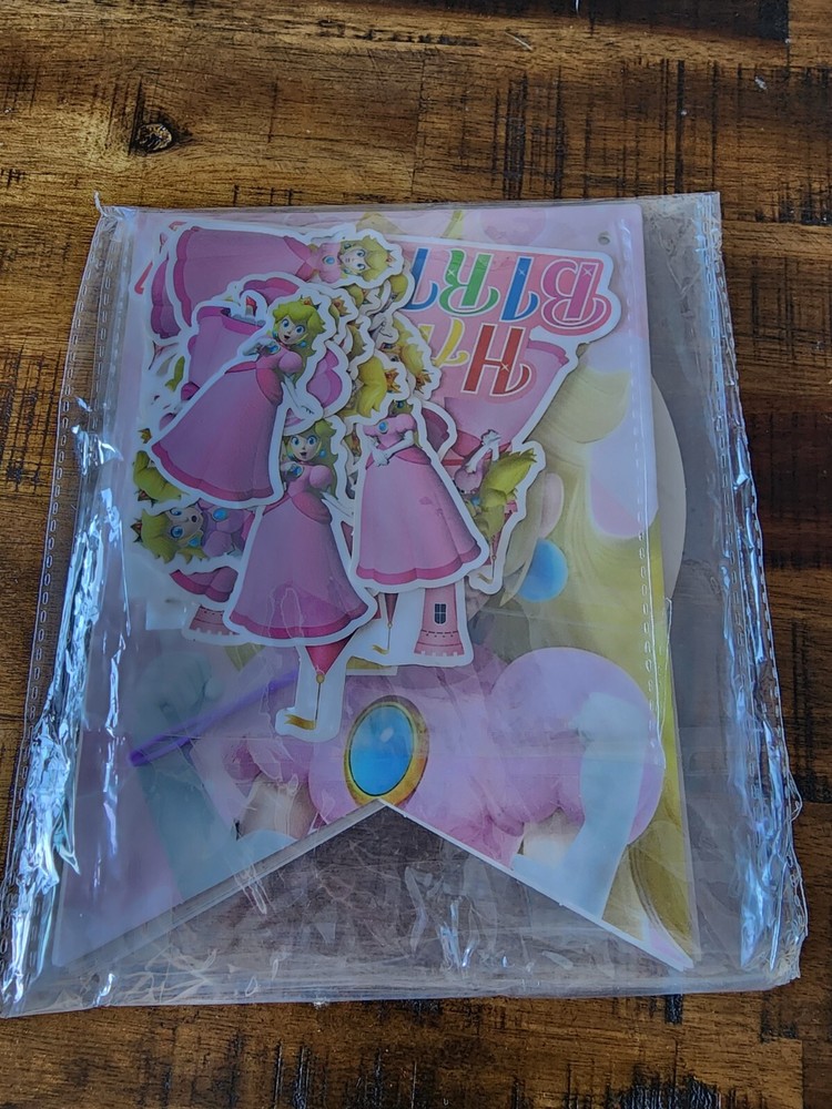 Princess Peach Birthday banner with table decorations
