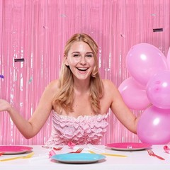 Pack of 2 pink metallic mesh curtains for parties, birthdays or baby showers.