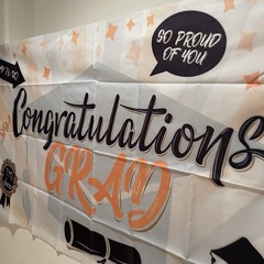 Congratulations Grad Banner – White, Orange, Black Party Decor