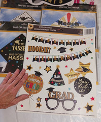 Graduation cap decorations, sign, napkins, garland, wishes, window cling. favors