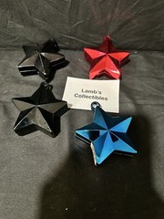 Star Shaped Balloon Weights 5.5oz ea lot of 4 – 2 Black, One Red, One Blue Party