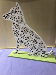 Filigree Style Laser Cut WhiteDog With Acrylic Green Eye.