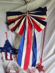 Patriotic Decorations Patriotic Bow, Tinsel Star, Tablecloth, Window Clings…..