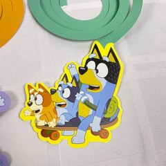Bluey Customizable Banner. Added in 11 spiral hanging deco pieces