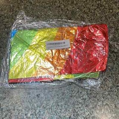 Rainbow shape 32” Mylar balloon multi color. New in plastic never opened
