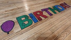 Happy Birthday Glittery Wall Sign – Multicolor Letters – Excellent