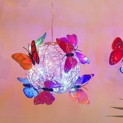 Captivating Solar Lighted Hanging Orb with Butterfly Lights for Yard Space