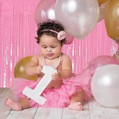 Pack of 2 pink metallic mesh curtains for parties, birthdays or baby showers.