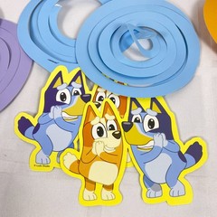 Bluey Customizable Banner. Added in 11 spiral hanging deco pieces